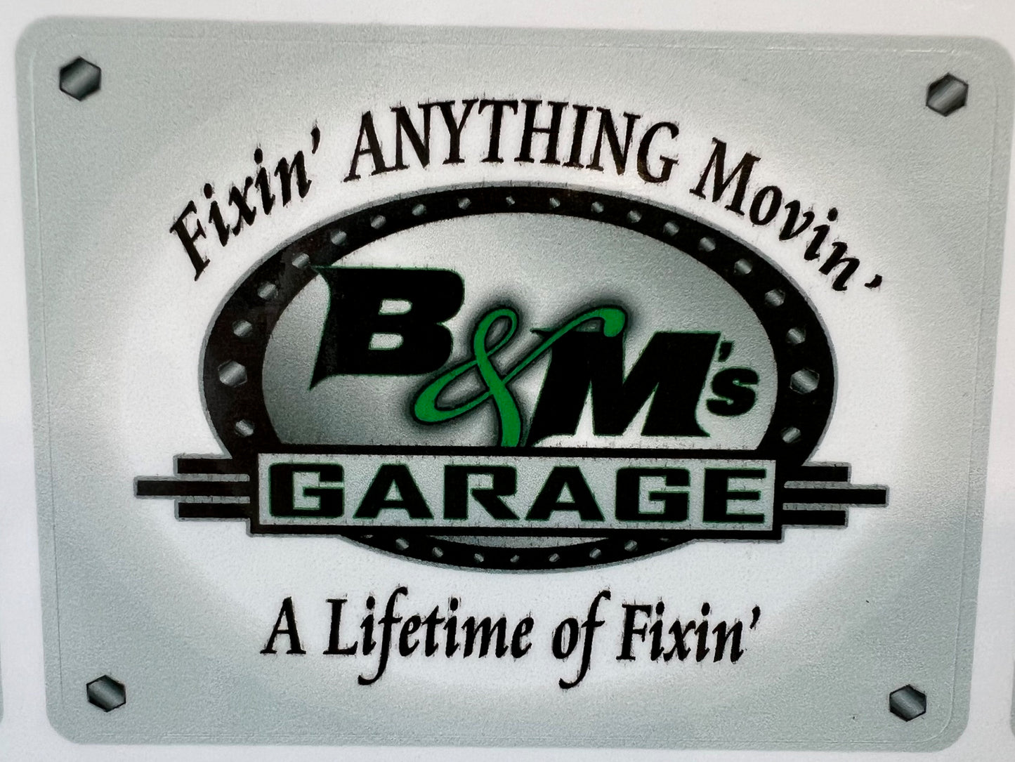 Sticker with B&M's Garage Original and New Slogan